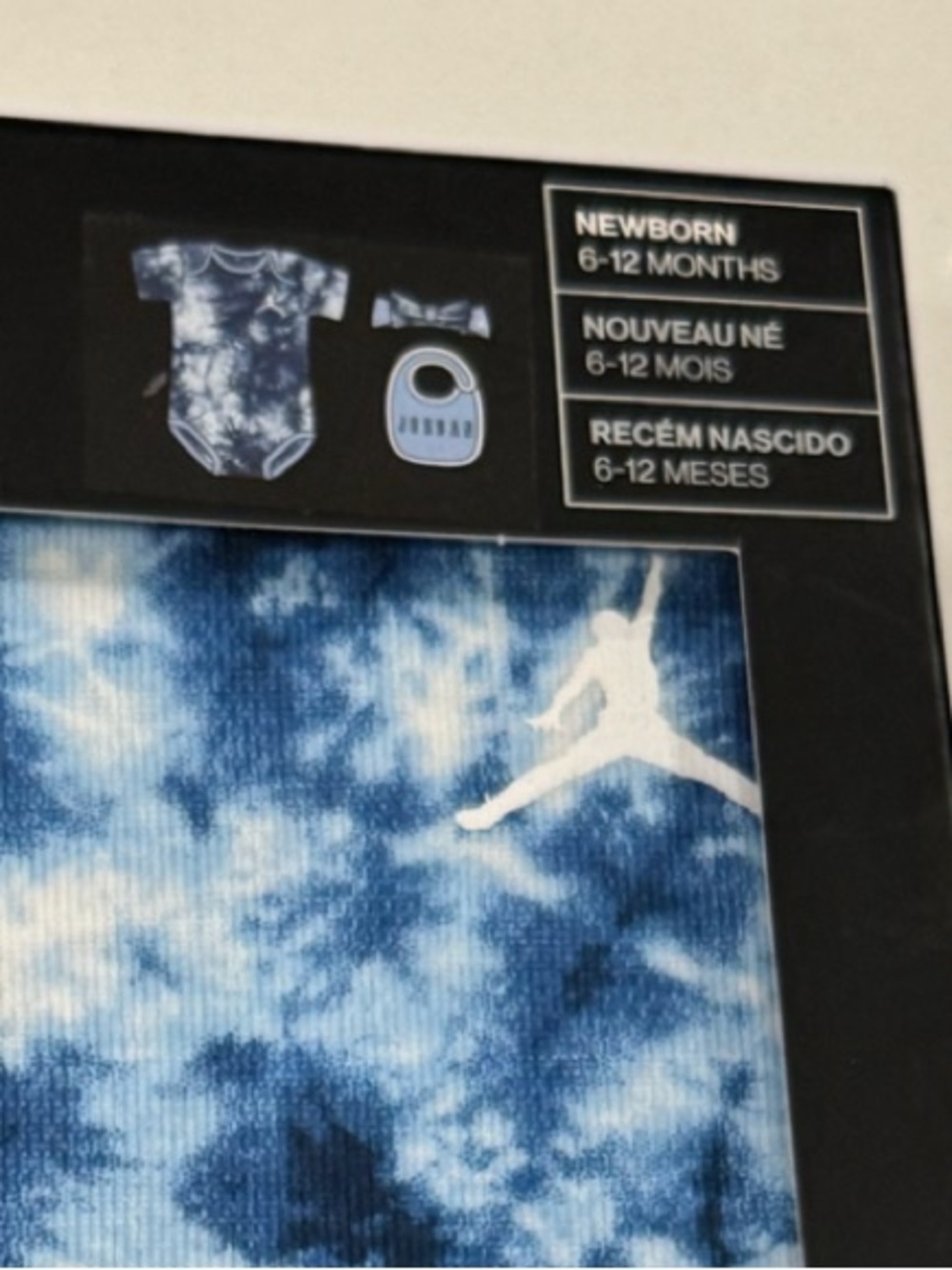 Jordan Baby 3-Piece Set - Light Blue Tie-Dye 6-12 Months - Bib / Hat / Bodysui